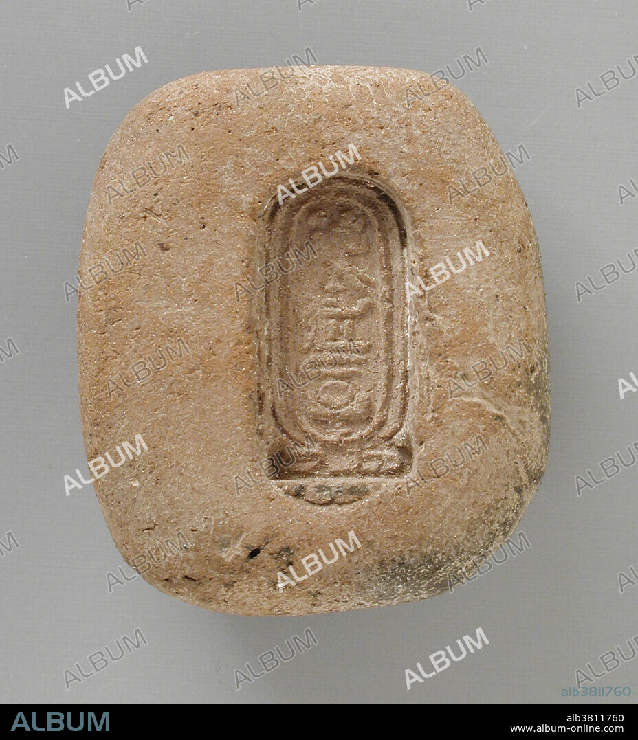 Terracotta mold with Cartouche of the God Aten, Egypt, New Kingdom, 18th Dynasty, reign of Akhenaten (1372-1355 BC). Aten was a being who represented the god or spirit of the sun, and the actual solar disk. He also signified the influence of the god Ra. He was depicted as a disk with rays reaching to the earth. At the end of the rays were human hands which often extended the ankh to the pharaoh. The deified Aten is the focus of the monolatristic, henotheistic, or monotheistic religion of Atenism established by Amenhotep IV, who later took the name Akhenaten in worship and recognition of Aten. In Egyptian hieroglyphs, a cartouche is an oval with a horizontal line erected at one end, indicating that the text enclosed is a royal name.