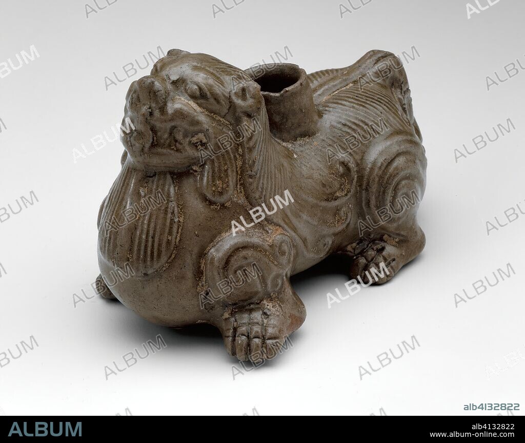 Stand in the Form of a Crouching Lion. China. Date: 265 AD-299 AD. Dimensions: 7.0 × 10.6 × 6.0 cm (2 3/4 × 4 3/16 × 2 3/8 in.). Yue ware; stoneware with underglaze molded decoration. Origin: China.