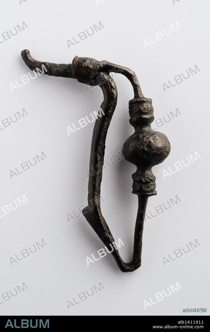 Bronze Fibula foot area of " La Tene " type 5, 5 x 3.5 cms - Second Iron Age from the archaeological site of " La Coronilla" in Alcalá de Henares - " Burgo de Santiuste Museum " (Madrid). SPAIN.