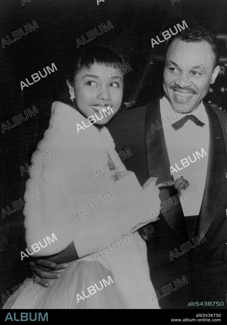 Joey Adams with American singer Pearl Bailey. Comedian Joey Adams obtained £535 a week for a U.S Government-sponsored tour of South-East Asia last year. This salary, twice that of many Government officials, has angered a U.S. Congressman. January 29, 1955.;Joey Adams with American singer Pearl Bailey. Comedian Joey Adams obtained £535 a week for a U.S Government-sponsored tour of South-East Asia last year. This salary, twice that of many Government officials, has angered a U.S. Congressman.