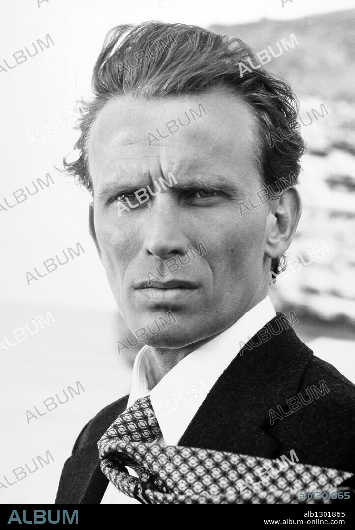 PETER WELLER.