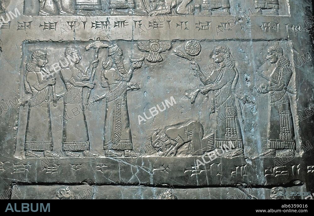 1000. PANEL FROM THE BLACK OBELISK OF KING SHALMANESER III. FROM NIMRUD, C. 825 B.C. PIC: KING SHALMANESER III. RECEIVING THE TRIBUTE OF KING JEHU OF ISRAEL WHO IS AT HIS KNEES AT THE FEET OF THE ASSYRIAN KING.