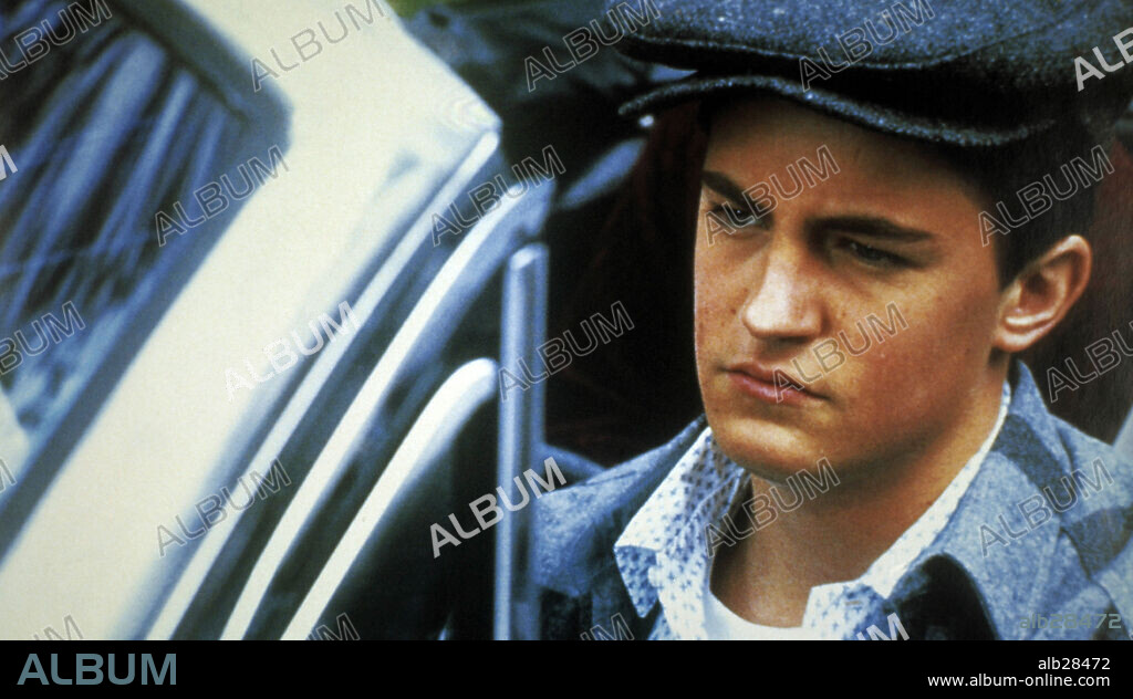 MATTHEW PERRY in A NIGHT IN THE LIFE OF JIMMY REARDON, 1988, directed by WILLIAM RICHERT. Copyright ISLAND PICTURES.