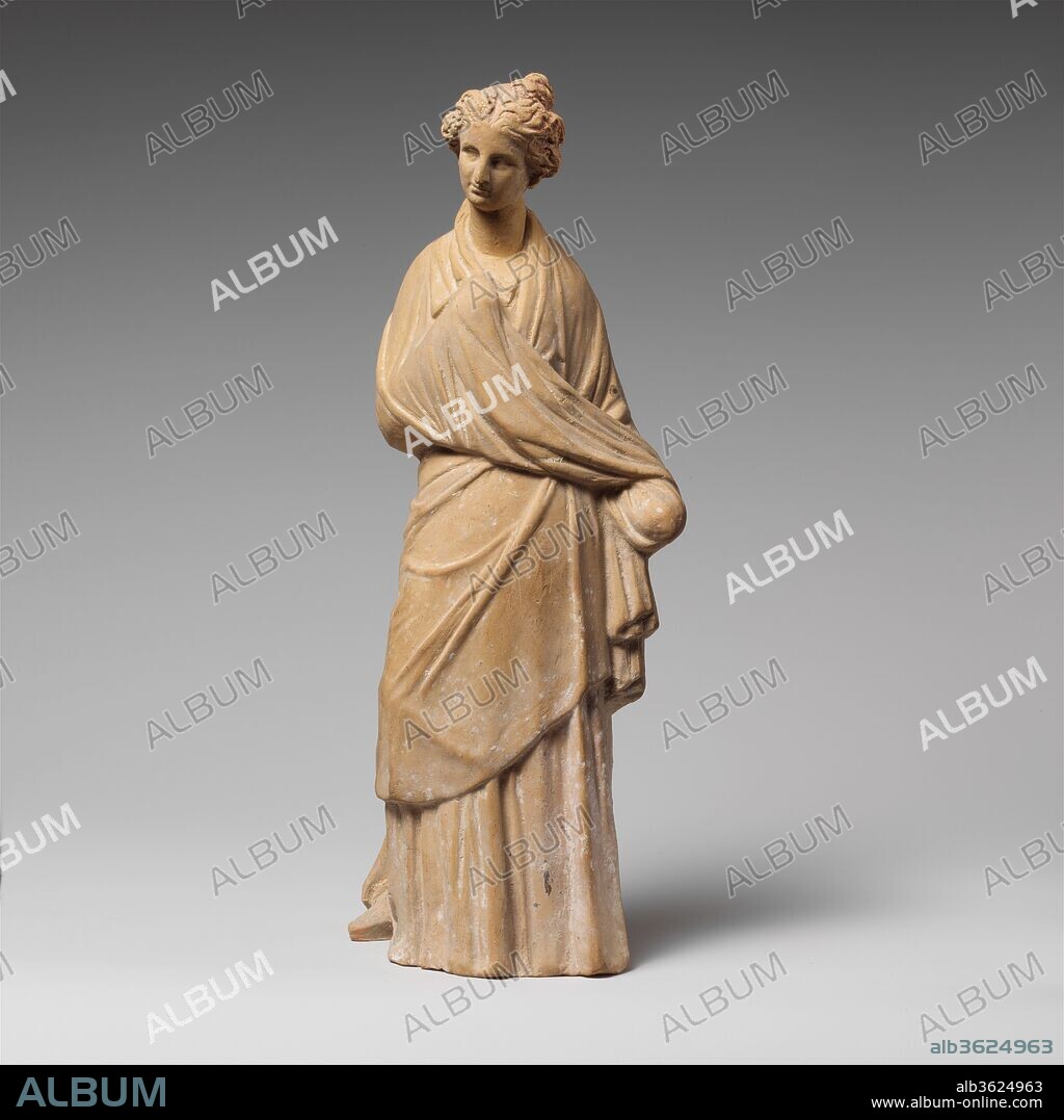 Terracotta statuette of a draped woman. Culture: Greek, Boeotian. Dimensions: Other: 10 1/2 in. (26.7 cm). Date: 3rd century B.C..
Although virtually all of her decorated surface is lost, this figure is noteworthy for the large size and sharp detail.