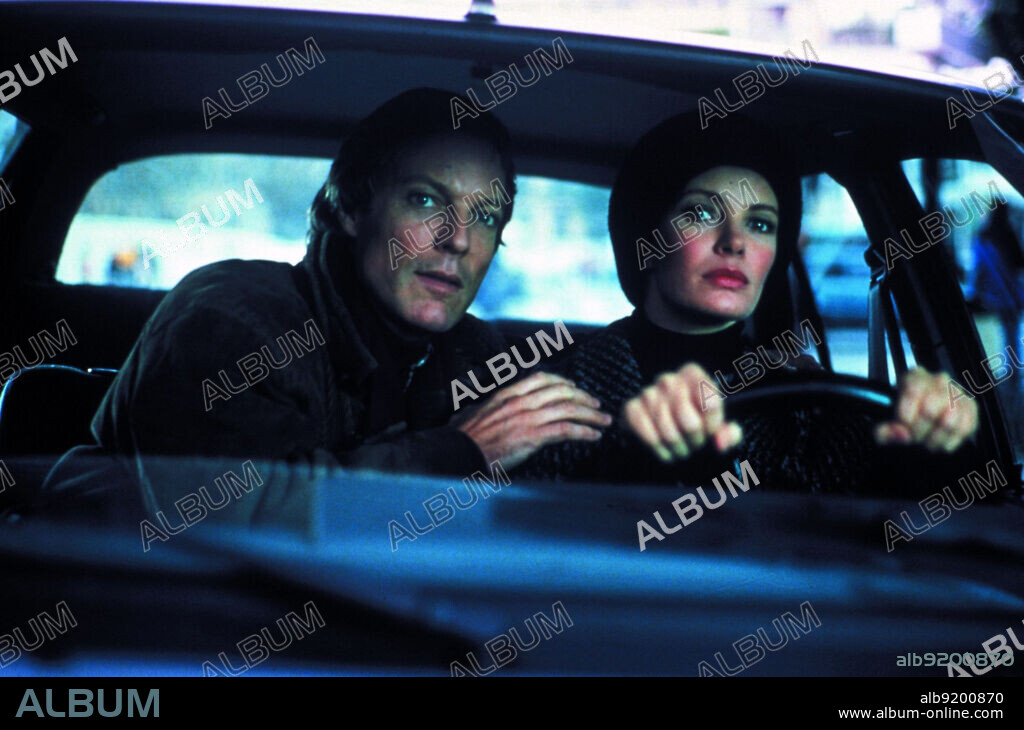 JACLYN SMITH and RICHARD CHAMBERLAIN in THE BOURNE IDENTITY, 1988, directed by ROGER YOUNG. Copyright WARNER BROS. TELEVISION.