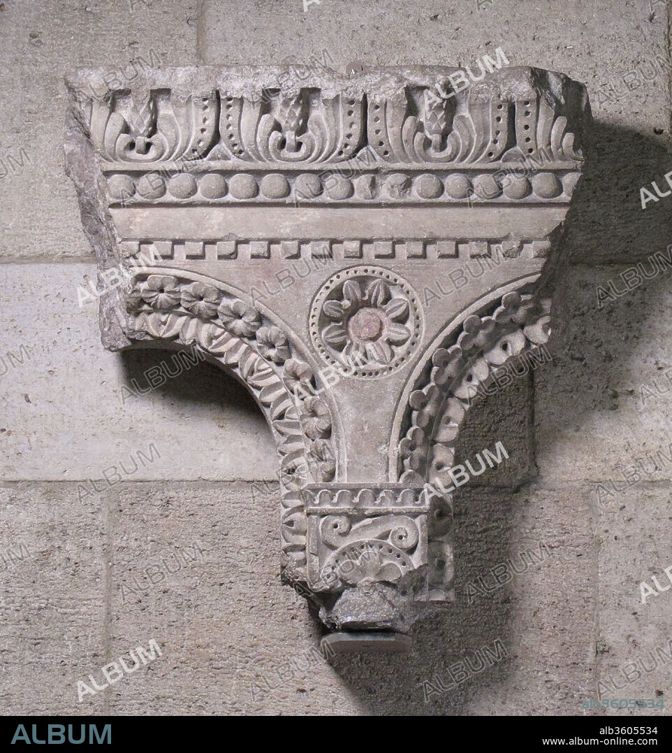 Spandrel. Culture: French. Dimensions: 25 1/2 x 23 1/2 in.  (64.8 x 59.7 cm). Date: ca. 1120-30.
This carving is one of the numerous surviving fragments from a great carved stone screen that once enclosed the choir in the third church built at Cluny, a sanctuary rivaled in size only by Saint Peter's in Rome. The monastery of Cluny, one of the most powerful in medieval Europe, was richly endowed by the kings of Castile and León as well as other European rulers. It was sustained by a network of hundreds of dependencies. 
The monastic buildings of Cluny--covering some 25 acres were acquired by the town in the wake of the French Revolution at the end of the eighteenth century and were almost completely destroyed. Elements from the building were adapted for reuse by the municipality.