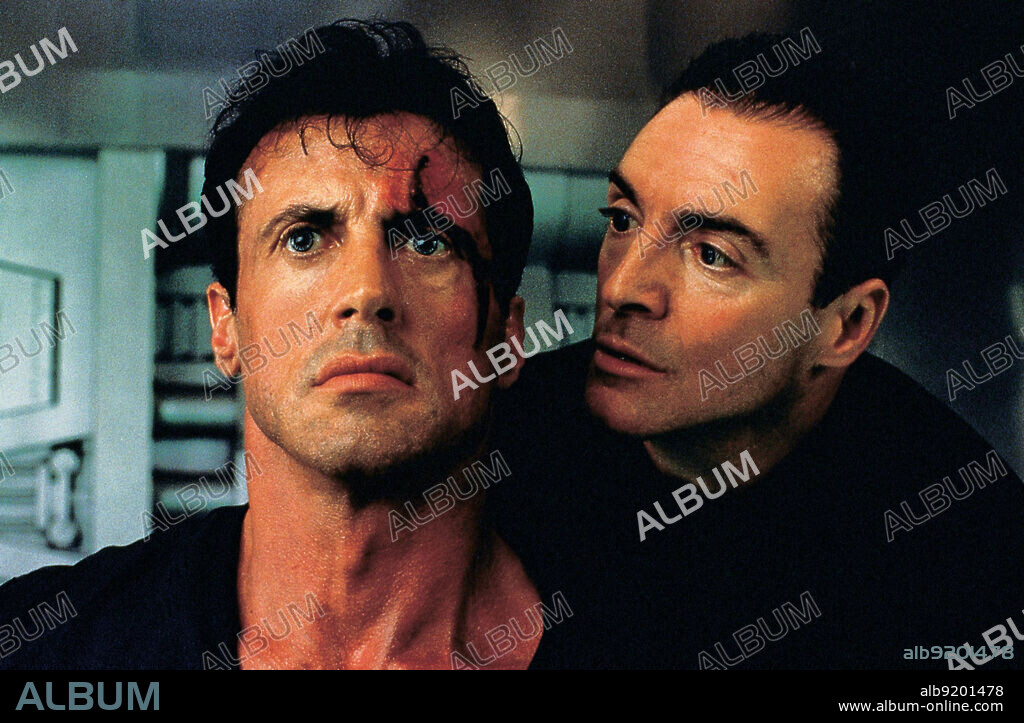 ARMAND ASSANTE and SYLVESTER STALLONE in JUDGE DREDD, 1995, directed by DANNY CANNON.