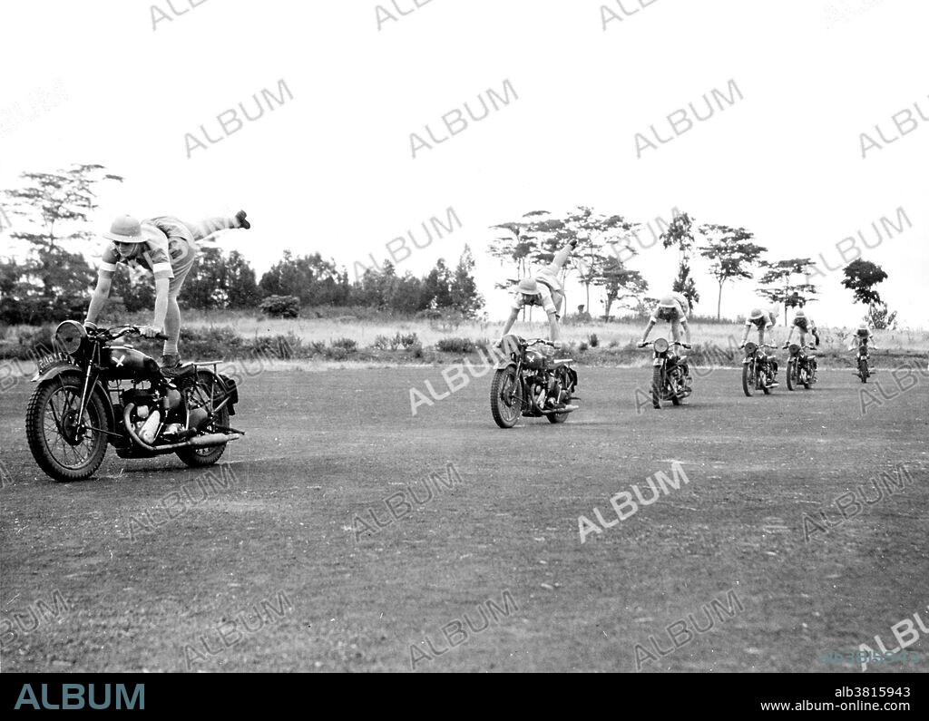 British women dispatch riders. South African girls who went to England to join the "First Aid and Nursing Yeomanry" learn stunt riding to give them balance and confidence in handling their machines. A dispatch is a military messenger, mounted on horse or motorcycle. In the UK 'despatch rider' is the most common term used for a motorcycle courier. Dispatch riders were used by armed forces to deliver urgent orders and messages between headquarters and military units. In WWII, Royal Corps of Signals soldiers carried out the role and the Royal Signals Motorcycle Display Team was formed from their number. They were also used by the Royal Air Force and the Royal Navy, where they maintained contact with land bases and some of the riders were members of the Women's Royal Naval Service. The British military often used Triumph, Norton, BSA, Matchless and Ariel for despatch riders, and although radio communications were much more advanced during WWII than WWI - huge numbers were produced. Photographed by the United States Office of War Information, Overseas Picture Division, 1942.