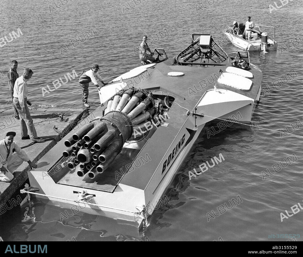 Seattle, Washington:  c. 1961. The Aqua-Jet on Lake Washington, a jet engine powered experimental speed boat made by Boeing. It is 38 feet long with a 17 foot beam, can reach speeds of 100 knots (115 mph), and is powered by an Allison J-3 turbojet with 4600 pounds of thrust.