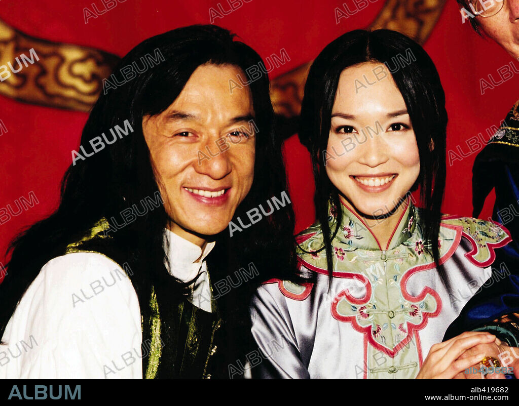 FANN WONG and JACKIE CHAN in SHANGHAI KNIGHTS, 2003, directed by DAVID DOBKIN. Copyright TOUCHSTONE PICTURES.