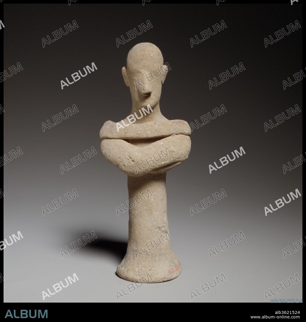 Standing male figurine. Culture: Cypriot. Dimensions: H. 5 1/2 in. (14 cm). Date: ca. 600-480 B.C..
The flaring cylindrical body is handmade and solid. He crosses his arms over his chest.