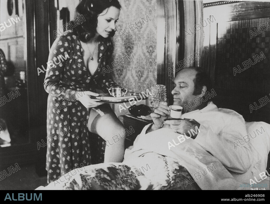 LAURA ANTONELLI and TURI FERRO in MALICIOUS, 1973 (MALIZIA), directed by  SALVATORE SAMPERI. Copyright PARAMOUNT PICTURES. - Album alb246908