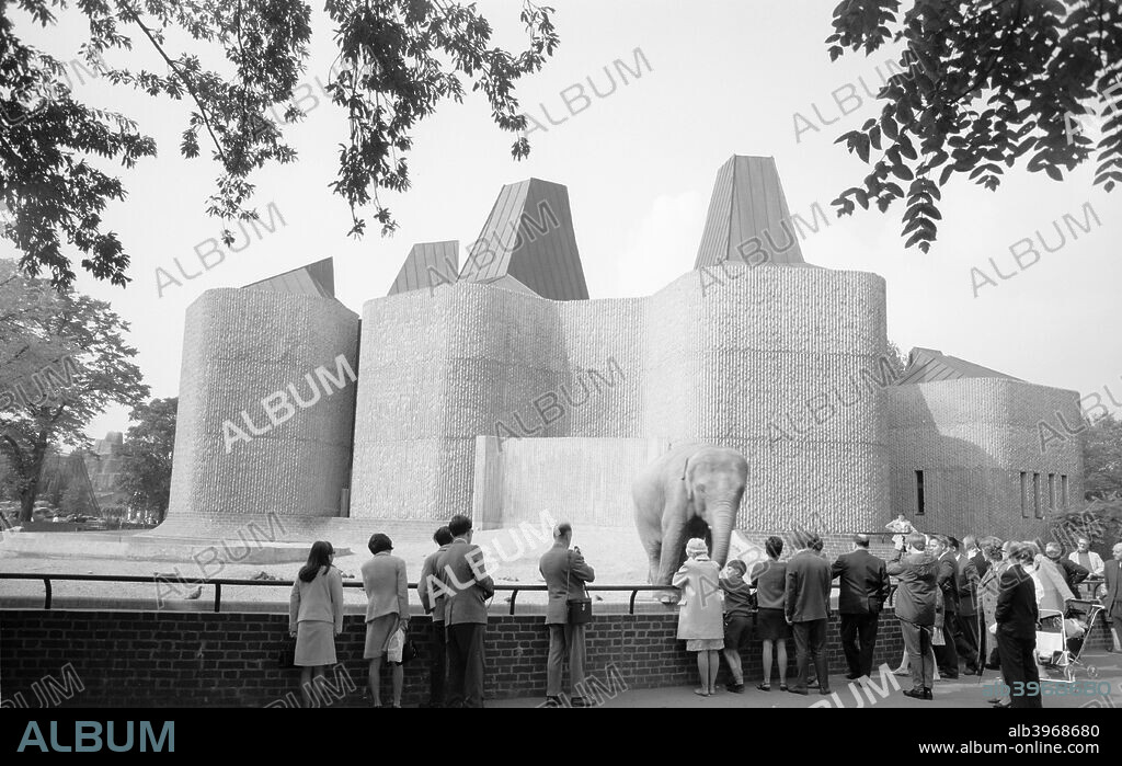 Elephant and rhino pavilion, London Zoo, Regent's Park, London, c1965. General view of the pavilion showing crowds and an elephant. The building was designed by Sir Hugh Casson and Neville Conder and finished in 1965. Photographed shortly after opening.