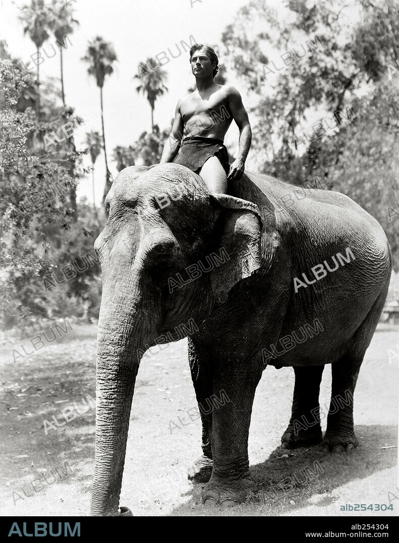 LEX BARKER in TARZAN'S SAVAGE FURY, 1952, directed by CY ENDFIELD. Copyright RKO.