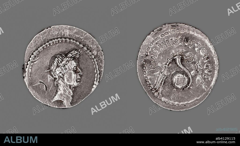 ANCIENT ROMAN. Denarius (Coin) Portraying Julius Caesar. Roman, minted in Rome. Date: 42 BC. Dimensions: Diam. 2 cm; 3.83 g. Silver. Origin: Rome.