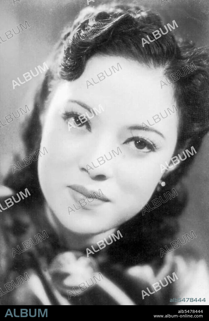 Yoshiko made her debut as an actress and singer in the 1938 film Honeymoon Express. She was billed as Li Xianglan, pronounced Ri Koran in Japanese. The adoption of a Chinese stage name was prompted by the Film company's economic and political motives—a Manchurian girl who had command over both the Japanese and Chinese languages was sought after. From this she rose to be a star and Japan-Manchuria Goodwill Ambassadress. Though in her subsequent films she was almost exclusively billed as Li Xianglan; she indeed appeared in a few as 'Yamaguchi Yoshiko.' Many of her films bore some degree of promotion of the Japanese national policy (in particular pertaining to the Greater East Asia Co-prosperity Sphere ideology). At the end of World War II, she was arrested by Chinese government for treason and collaboration with the Japanese. However, she was cleared of all charges, and possibly the death penalty, since she was not a Chinese national, and thus the Chinese government could not try her for treason. And before long in 1946, she settled in Japan and launched a new acting career there under the name Yoshiko Yamaguchi. In 1974, she was elected to the House of Councillors (the upper House of the Japanese parliament), where she served for 18 years (three terms).