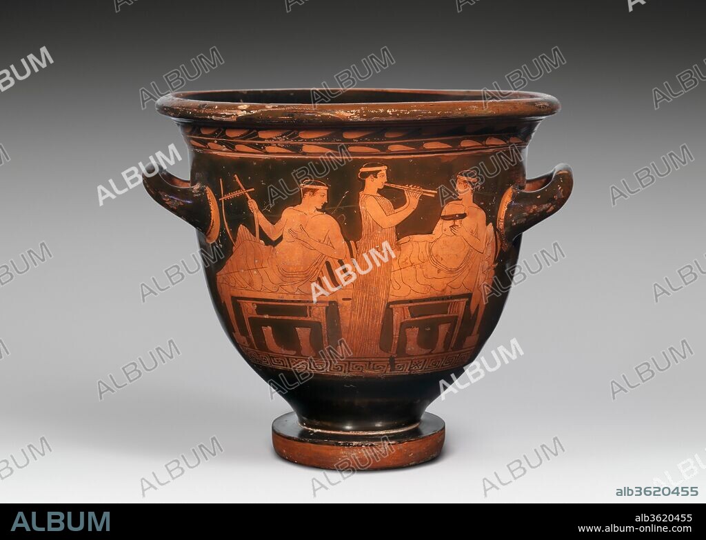 Terracotta bell-krater (bowl for mixing wine and water). Culture: Greek, Attic. Dimensions: Other: 13 1/4 × 16 in. (33.7 × 40.6 cm)
Diameter: 15 × 6 1/4 in. (38.1 × 15.9 cm). Date: mid-fifth century B.C..
With only three figures and carefully selected and rendered details - the musical instruments, the drinking cup, the boots on the floor, the representation captures and characterizes a Classical symposium. The scene is noteworthy for its gravity.