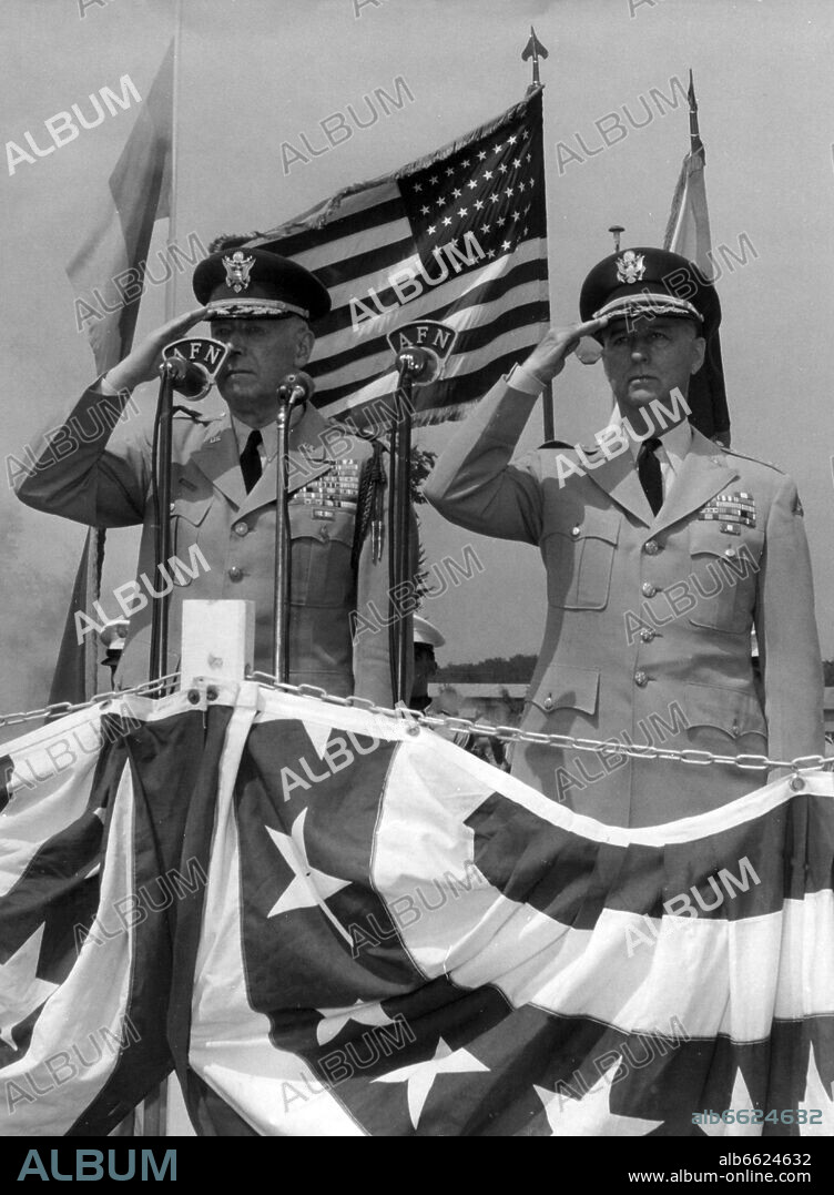 US generals Bruce C. Clarke (l) and Clyde D. Eddleman (r) salute during a short, military ceremony in the headquarters of the 7th US army in Stuttgart on the 1st of July in 1958. Clarke handed over his command of the 7th US army to Eddleman with immediate effect. 01/07/1958