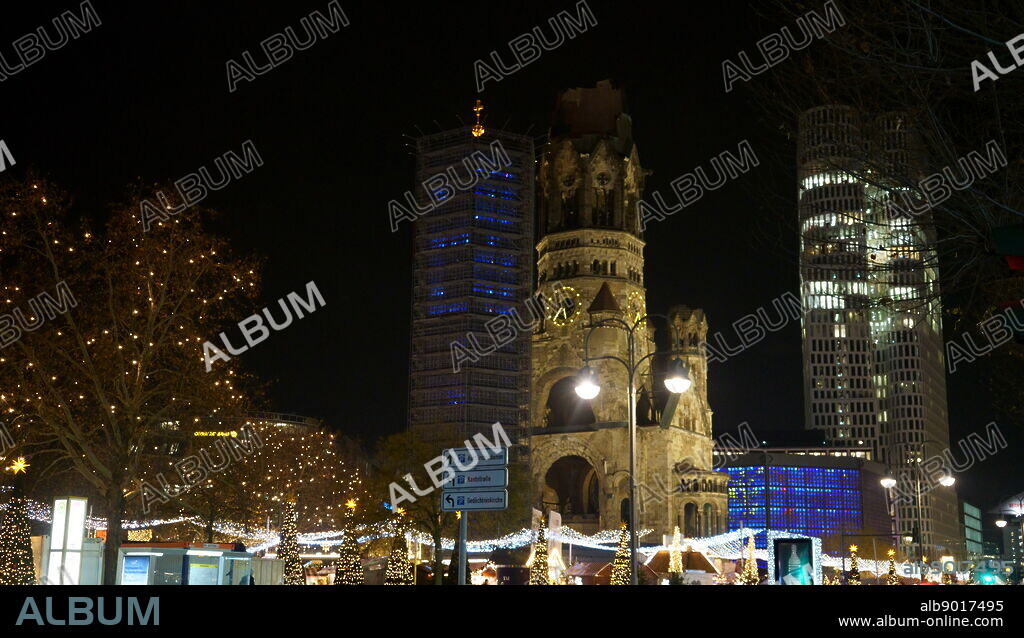 The Kaiser Wilhelm Memorial Church (Gedachtniskirche), Protestant church, located in Berlin on the Kurfurstendamm in the centre of the Breitscheidplatz. The original church on the site was built in the 1890s. It was badly damaged in a bombing raid in 1943. The present building, which consists of a church with an attached foyer and a separate belfry with an attached chapel, was built between 1959 and 1963.