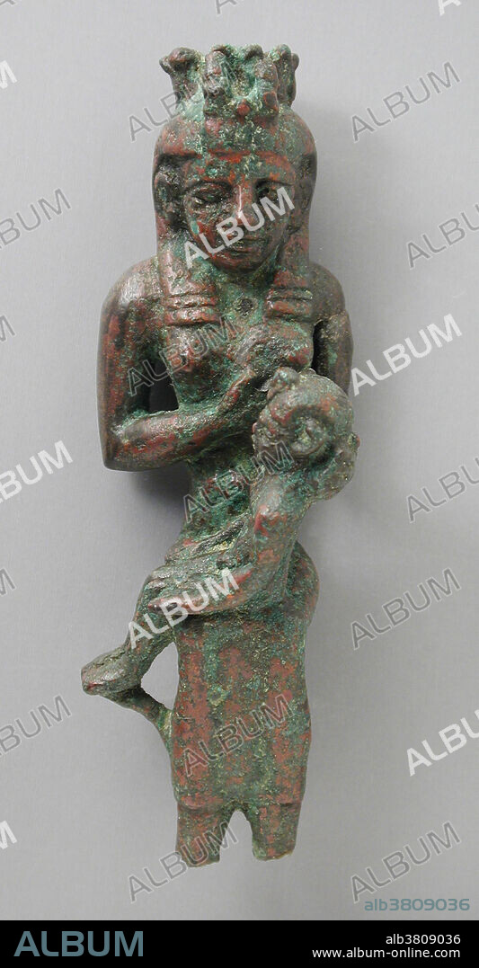 Bronze sculpture of Isis with Uraeus Modius holding child on her lap, Egypt, Late Period - Ptolemaic Period (711-30 BC). Isis is a goddess in Ancient Egyptian religious beliefs, whose worship spread throughout the Greco-Roman world. She was worshipped as the ideal mother and wife as well as the patroness of nature and magic. She was the friend of slaves, sinners, artisans, and the downtrodden, and she listened to the prayers of the wealthy, maidens, aristocrats, and rulers. Isis is also known as protector of the dead and goddess of children. Isis was a fertility goddess, the sister and wife of Osiris, mother of Horus, sister of Set, and Nephthys, and daughter of Geb and Nut. She searched for her husband's body, retrieved and reassembled Osiris, taking on the role of goddess of the dead. The Uraeus is the stylized, upright form of an Egyptian cobra (asp, serpent, or snake), used as a symbol of sovereignty, royalty, deity, and divine authority in.