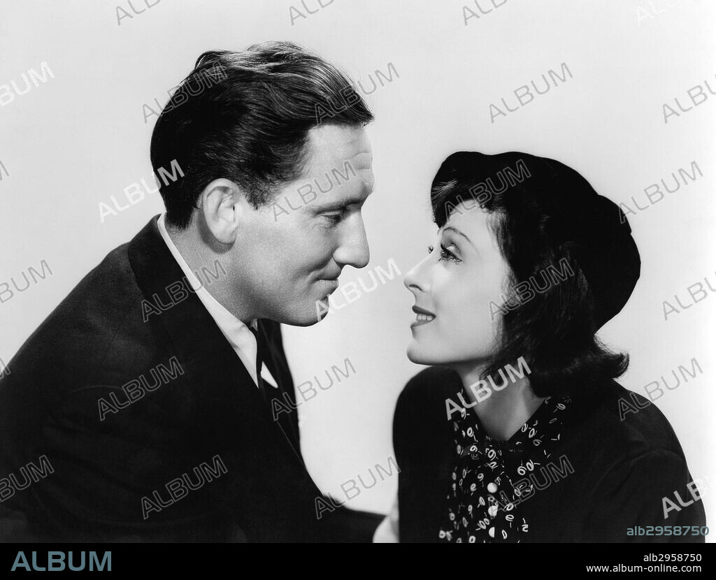 LUISE RAINER and TRACY SPENCER. LUISE RAINER and SPENCER TRACY in BIG CITY, 1937, directed by FRANK BORZAGE. Copyright M.G.M.