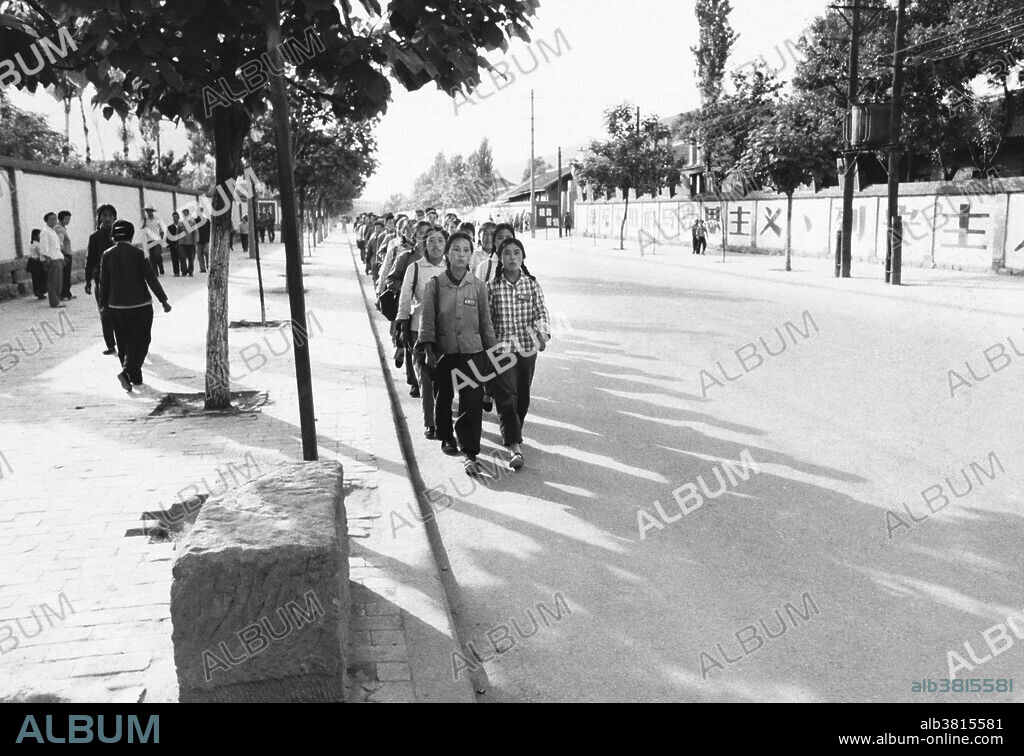 Students who were removed from schools during China's Cultural Revolution and sent to the Yenan region.  These high school- and university-age young women are members of the  the Liu Ling Commune's Willow Grove Brigade.  1971.