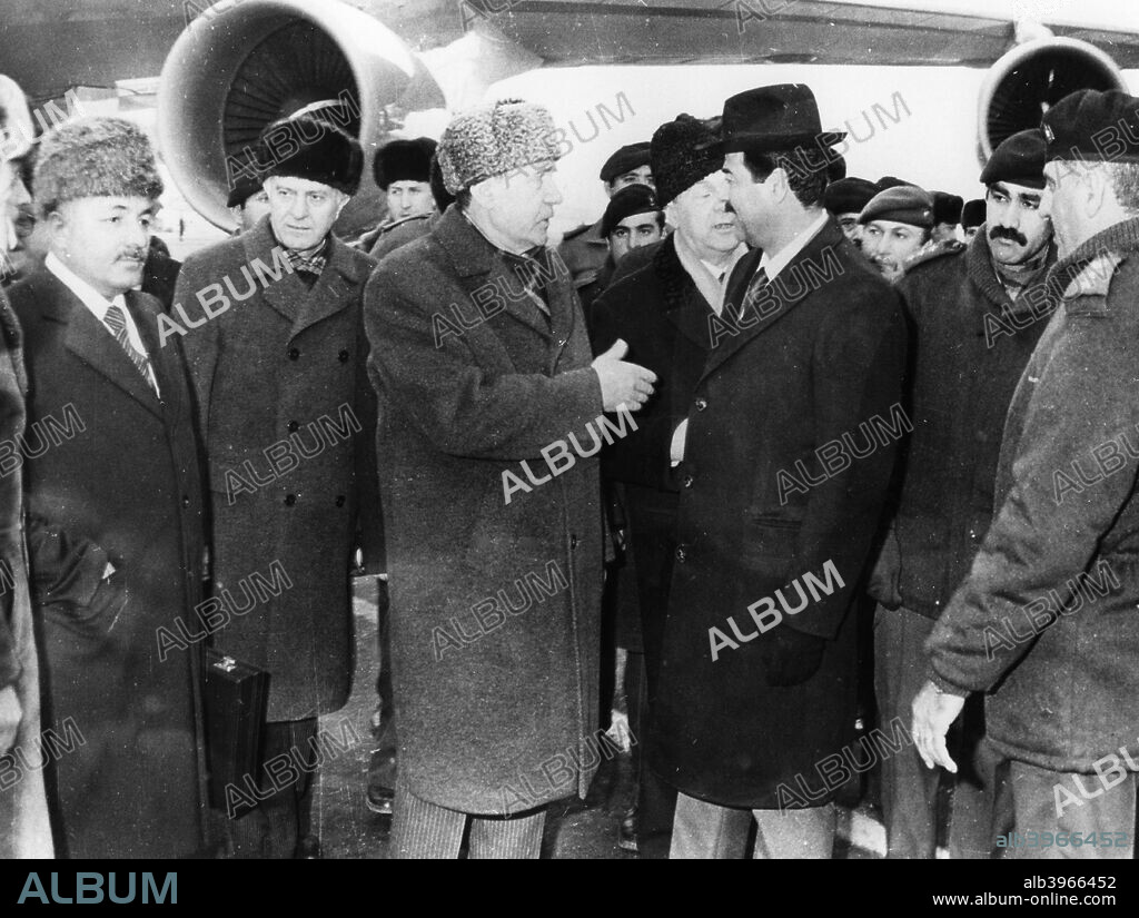 Saddam Hussein and Andrei Gromyko, Moscow, Russia, 1986. The President of Iraq shaking hands with the Soviet Foreign Minister on a visit to the USSR.