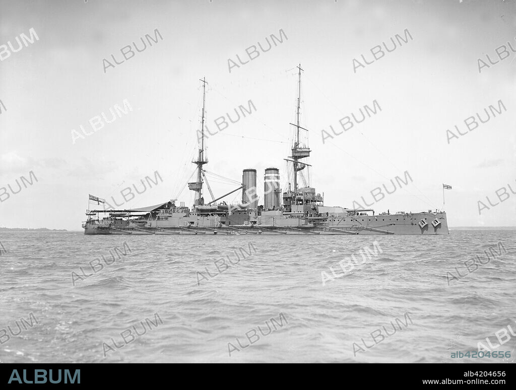 'HMS Hindustan', 1911. HMS Hindustan was a King Edward VII-class pre-dreadnought battleship of the Royal Navy. Commissioned in mid 1905, she served with firstly the Atlantic Fleet and then the Channel Fleet. During WW1 'Hindustan' served in the Grand Fleet until April 1916. During sweeps by the fleet, she and her sister ships often steamed at the heads of divisions of the far more valuable dreadnoughts, where they could protect the dreadnoughts by watching for mines or by being the first to strike them.