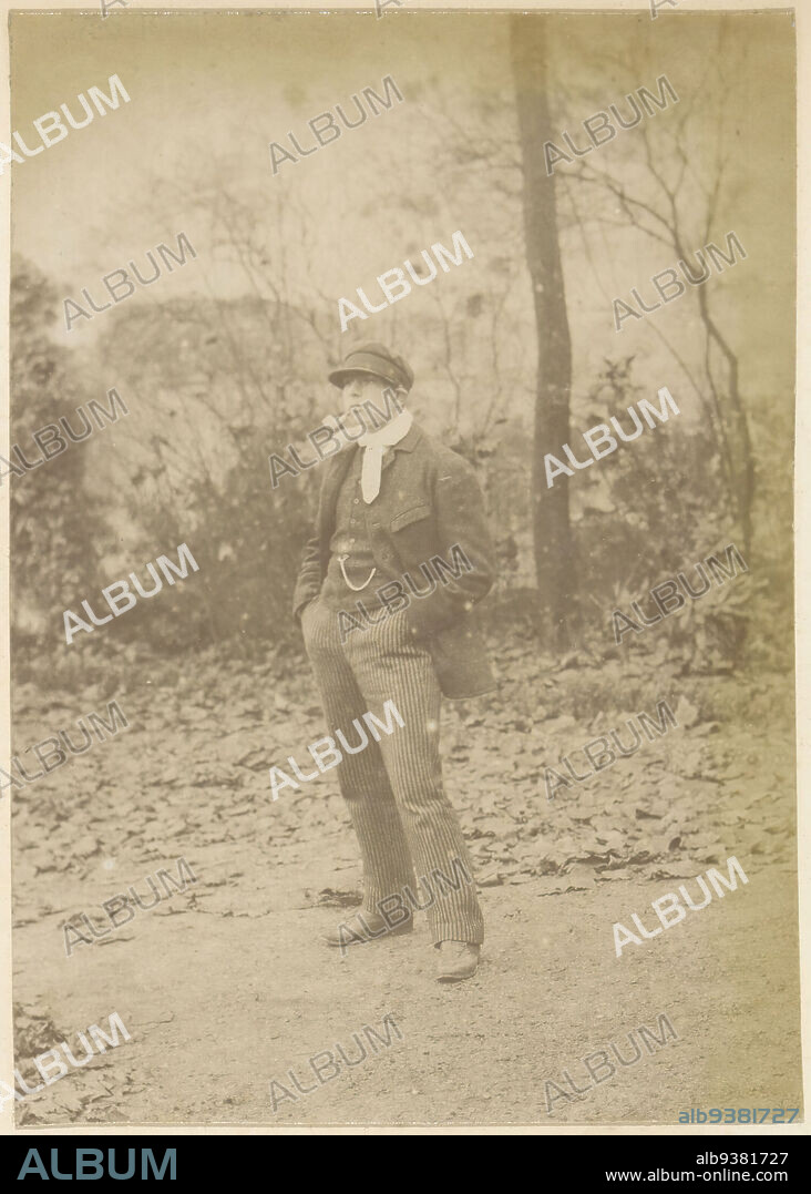 Portrait of a French young man with pipe and cap, holding his hands in his  pockets, Part of Photo album of a French amateur photographer with shots of  a family, distillery -