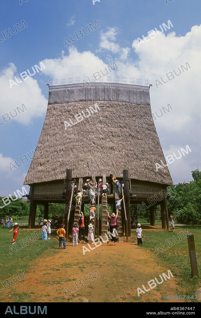 Vietnam: School children visit a Bahnar rong or communal house, Vietnam ...