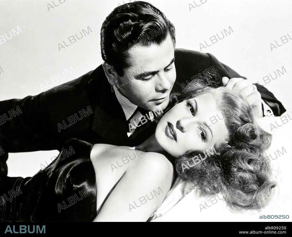 GLENN FORD and RITA HAYWORTH in GILDA, 1946, directed by CHARLES VIDOR. Copyright COLUMBIA PICTURES.