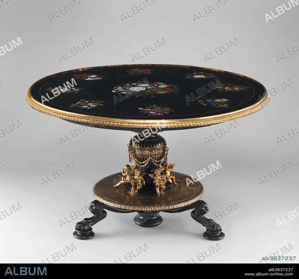 Marble-top table. Culture: Italian, Florence. Designer: Theophil Hansen (Danish, Copenhagen 1813-1891 Vienna). Dimensions: Height (stand): 30 1/2 in. (77.5 cm); Diameter (table top): 51 in. (129.5 cm). Founder: Cast by Hagenmeyer. Maker: Stand executed by Heinrich Dübell (active ca. 1853-80). Manufactory: Top executed at Opificio delle Pietre Dure, Florence, Italy. Modeler: Bronze sculptures modeled by Josef Dollischek (active 1865-72). Date: ca. 1855-60.
When this table arrived at the Metropolitan, it was thought to have been made in Florence about 1880; however, Museum curator James Parker pointed out that the "stand for the table top, which does not resemble [1880s] Italian work, was probably made at about the same time in Vienna, where both table top and stand were in the early years of the twentieth century."[1]
Recent research has focused on the stand; the quality of its design and the subtle execution point to Theophil (Theophilus Edvard) Hansen, one of the most important architects of the second half of the nineteenth century. After studying at the Academy in Copenhagen, Hansen won a scholarship in 1838 and traveled to Berlin, where he became an admirer of architect and designer Karl Friedrich Schinkel's work (see the catalogue entries for acc. nos. 1996.30 and 2000.189). Following a stay in Munich, Hansen embarked on a study tour of Italy and Greece, before settling in Vienna in 1846. There he helped construct several public buildings, including the museum of arms and armor at the Viennese arsenal. Hansen soon became one of the most sought-after architects in the Austrian capital. Together with Friedrich von Schmidt and Heinrich von Ferstel, he was part of the triumvirate that dominated Viennese architecture in the 1860s and 1870s.[2]  During these years he created the Wiener Stil (Vienna Style), a distinguished and elegant interpretation of High Renaissance art. He also helped design the famous boulevard known as the Ringstrasse. After the Austrian Parliament (1873-83), Hansen's best-known creation may be the imposing Golden Hall at the Vienna Musikverein, of 1867-69, in which the Vienna Philharmonic performs its annual concert on New Year's Day, an event that has been televised around the world for decades and has acquainted millions of music lovers with Hansen's magnificent architecture.
During the 1860s Hansen was mainly concerned with the interior decoration of two grand Viennese houses, the Palais Todesco and the Palais Epstein and Ephrussi. His patrons were wealthy men who wanted to showcase their possessions (which symbolized their accomplishments) in the artistically decorated reception rooms of their splendid mansions.[3]  The owner of the Palais Todesco, like his colleagues S. M. von Rothschild and Baron Jonas Königswarter, was a powerful Austrian banker and member of the Vienna stock exchange.[4] These elites moved in what has been called a "second society,"[5] a different world from that of the old Austrian aristocracy. Wealth was its basis, and its lifeblood was the practice of unregulated capitalism. In the private office of Eduard Todesco, directly over his desk, was a fresco, The Allegory of Trading. For this sophisticated patron of art, wealth was not only the means to acquire the beautiful things that he wanted but an aspect of his identity.[6]
The Museum's table stood in one of the most important public rooms in the Palais Todesco, the Salon, which was located between the Ballroom and the much smaller Boudoir.[7] The Salon was the scene of intimate concerts, as is suggested by the music-making putti on the table's base, and on occasion served as a drawing room where the ladies played cards and socialized while the gentlemen visited the Billiards Room to enjoy smoking, alcoholic beverages, and other amusements. The eight floral compositions on the tabletop probably marked the places of participating card players. The table is part of an ensemble that was specifically created for the Salon by Hansen. In 1866 the suite was described as one of Hansen's finest creations in the "modern" style.[8] The unifying elements are the vase-shaped legs of the chairs and table and the bronze figures decorating them.[9]  Not much is known about the Viennese court cabinetmaker Heinrich Dübell, who made the stand; some very diverse furniture by him exists, documenting his workshop's flexibility.[10]
The Opificio delle Pietre Dure, the stone-workers' manufactory that made the top, was founded in 1588 by the Medici family in Florence. Late Renaissance tables by the Opificio with pietre dure (hardstone mosaic) tops supported on carved-wood vase-shaped stands with putti decoration could have influenced Hansen.[11] The 1860s, when the table is first recorded, were years of dramatic political change on the Italian peninsula. Tuscany had been ruled by the house of Hapsburg-Lorraine since 1765. After the uprising under Giuseppe Garibaldi (1807-1882), Grand Duke Ferdinand IV of Hapsburg-Toscana had to leave Tuscany, which became part of a unified Italy. It is likely that this tabletop was bought shortly before 1860, possibly as a souvenir of some northern visitor's grand tour; many travelers purchased the famous pietre dure panels and had them mounted on stands as console or center tables by cabinetmakers at home. A similar eclectic table is depicted in a portrait of Emperor Francis I of Austria (1768-1835) by Friedrich von Amerling (1803-1887),[12] and there exist several examples of pietre dure tops on later stands in the Chinese (Blue) Salon at Schönbrunn Palace, in Vienna.[13]
[Wolfram Koeppe 2006]
Footnotes:
[1] The Metropolitan Museum of Art. Notable Acquisitions, 1982-1983. New York, 1983, p. 36 (entry by James Parker). Parker was following a remark of the donor to Olga Raggio, then the chairman of the Department of European Sculpture and Decorative Arts.
[2] George Niemann and Ferdinand Fellner von Feldegg. Theophilos Hansen und seine Werke. Vienna, 1893, p. 114. See also Renate Wagner-Rieger and Mara Reissberger. Theophil von Hansen. Die Wiener Ringstrasse, Bild einer Epoche 8, pt. 4. Wiesbaden, 1980.
[3] Eva B. Ottillinger and Lieselotte Hanzl. Kaiserliche Interieurs: Die Wohnkultur des Wiender Hofes im 19. Jahrhundert und die Wiener Kunstgewerbereform. Museen des Mobiliendepots 3. Vienna, 1997, p. 357.
[4] Renate Wagner-Rieger and Mara Reissberger. Theophil von Hansen. Die Wiener Ringstrasse, Bild einer Epoche 8, pt. 4. Wiesbaden, 1980, pp. 240-41.
[5] Eva B. Ottillinger and Lieselotte Hanzl. Kaiserliche Interieurs: Die Wohnkultur des Wiender Hofes im 19. Jahrhundert und die Wiener Kunstgewerbereform. Museen des Mobiliendepots 3. Vienna, 1997, p. 357.
[6] Renate Wagner-Rieger and Mara Reissberger. Theophil von Hansen. Die Wiener Ringstrasse, Bild einer Epoche 8, pt. 4. Wiesbaden, 1980, p. 241.
[7] Ibid., p. 219.
[8] Gewerbehalle (Stuttgart), no. 2 (1866); cited in Eva B. Ottillinger and Lieselotte Hanzl. Kaiserliche Interieurs: Die Wohnkultur des Wiender Hofes im 19. Jahrhundert und die Wiener Kunstgewerbereform. Museen des Mobiliendepots 3. Vienna, 1997, pp. 357, 359.
[9] Eva B. Ottillinger and Lieselotte Hanzl. Kaiserliche Interieurs: Die Wohnkultur des Wiender Hofes im 19. Jahrhundert und die Wiener Kunstgewerbereform. Museen des Mobiliendepots 3. Vienna, 1997, pp. 356, 357,  figs. 211-13.
[10] On Dübell, see Georg Himmelheber. Die Kunst des deutschen Möbels: Möbel and Vertäfelungen des deutschen Sprachraums von den Anfängen bis zum Jugendstil. Vol. 3, Klassizismus, Historismus, Jugendstil. 2nd ed. Munich, 1983, p. 281, n. 484, figs. 708, 711, 848, 850, 879, 894. For the sculptor Josef Dollischek, see Alois Kieslinger. Die Steine der Wiener Ringstrasse: Ihre Technische und Künstlerische Bedeutung. Die Wiener Ringstrasse, Bild einer Epoche 4. Wiesbaden, 1972.
[11] La collezione Chigi Saracini di Siena: Per una storia del collezionismo italiano. Exh. cat., Palazzo del Te, Mantua. Florence, 2000, p. 145.
[12] Georg Kugler. Schloss Schönbrunn: Die Prunkräume. Vienna, 1995, p. 66.
[13] Ibid., pp. 110-11; for similar pietre dure compositions, see Anna Maria Giusti, Paolo Mazzoni, and Annapaula Pampaloni Martelli. Il Museo dell'Opificio delle Pietre Dure a Firenze. Gallerie e musei di Firenze. Milan, 1978,  figs. 19, 22, 24, 27, 28, 29-31, 34-37, 197-221; and Claudio Paolini, Alessandra Ponte, and Ornella Selvafolta. Il bello "ritrovato": Gusto, ambienti, mobili dell'Ottocento. Novara, 1990, p. 452.