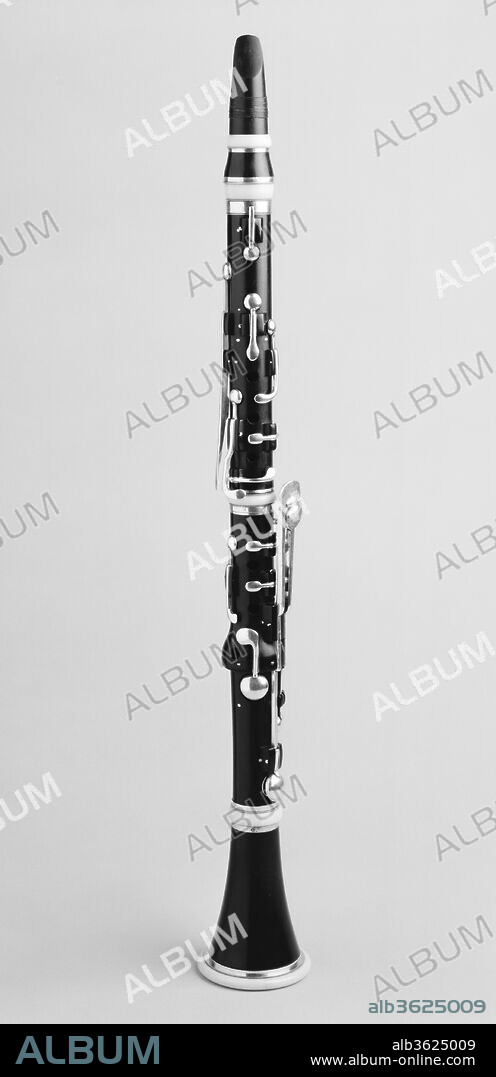 Clarinet in C. Dimensions: L. 59.3 cm (23-3/8 in.) W. of case 25.8 cm (10-1/4 in.). Maker: Graves & Company. Date: ca. 1845.
Grenadilla, ivory, 13 silver keys.  A variant of the English-style clarinet with a concealed connecting lever of the highest (speaker-) key. C was the main size used in nineteenth-century bands.