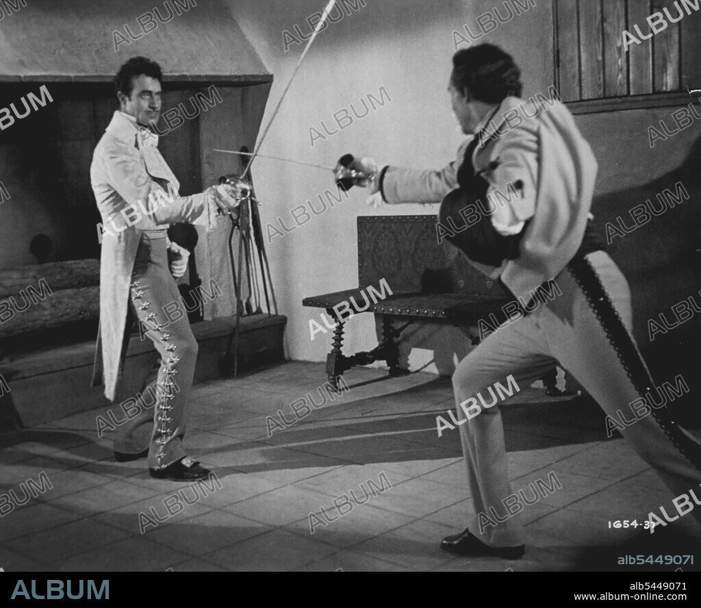 Don Renegade -- Hampered by a broken arm, Marcos (Ricardo Montalban) fights a duel to the death with Don Pedro (Gilbert Roland) in this exciting scene from Universal-International's "Don Renegade," a story of Early California filmed in Technicolor. September 15, 1952. (Photo by Universal International).