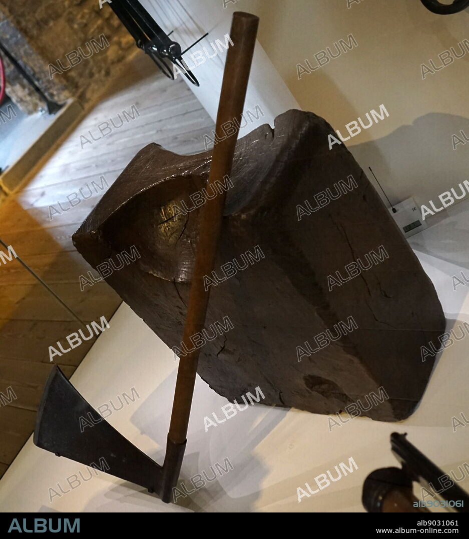 Wooden execution block and axe for beheadings England. Dated 18th Century.