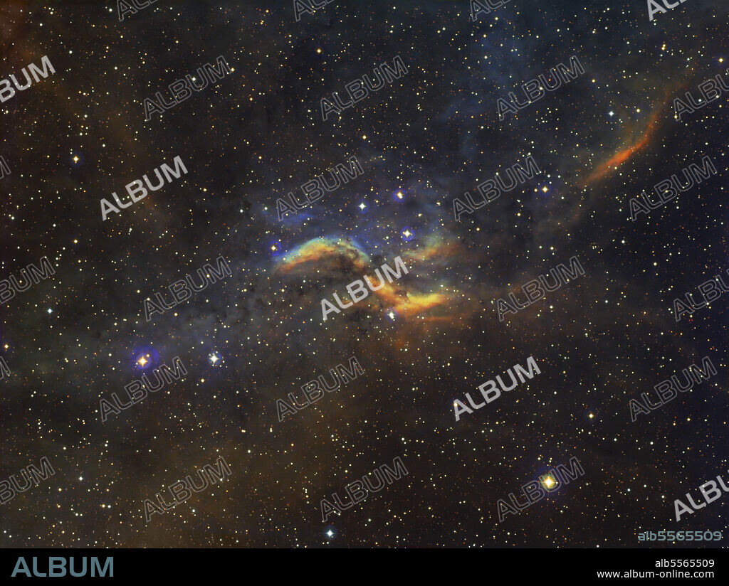 The Propeller Nebula, also known as DWB 111 or Simeis 57, lies in the constellation Cygnus, near a Wolf-Rayet star (WR-140).