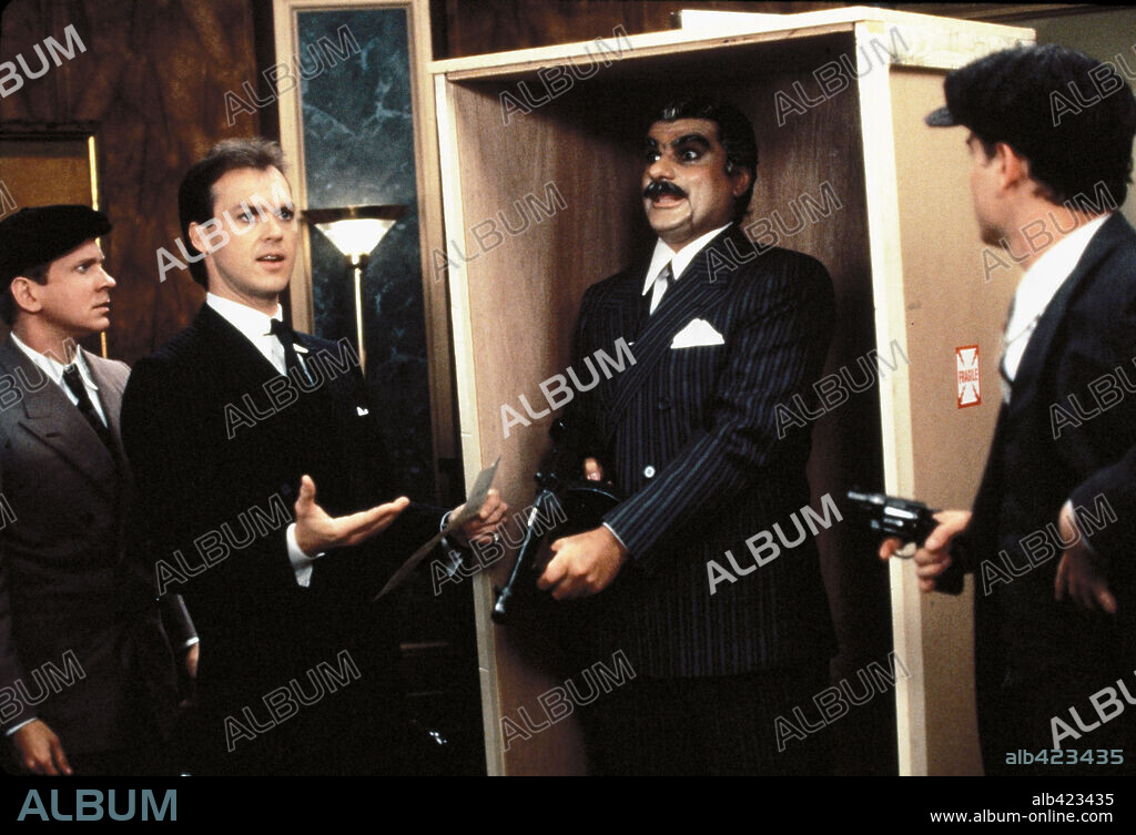 MICHAEL KEATON in JOHNNY DANGEROUSLY, 1984, directed by AMY HECKERLING.  Copyright 20TH CENTURY FOX. - Album alb423435