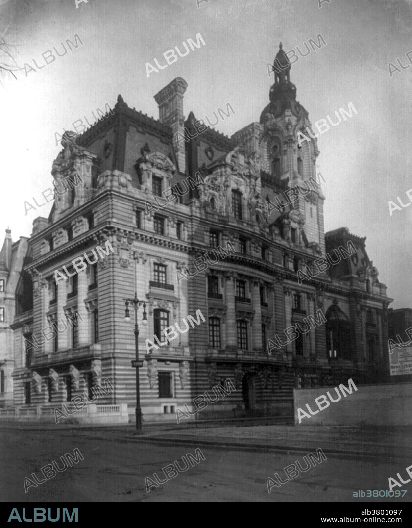 The William A. Clark House, also known as "Clark's Folly", was a mansion located at 952 Fifth Avenue on the northeast corner of its intersection with East 77th Street on the Upper East Side of Manhattan. Clark, a wealthy entrepreneur and politician from Montana, commissioned the New York firm of Lord and Hewlett to build the house in 1897. The house was completed in 1911, after numerous legal disputes, at a cost of $7 million ($177,775,000 in 2015). The house contained 121 rooms, 31 baths, four art galleries, a swimming pool, a concealed garage, and a private underground rail line to bring in coal for heat. In 1925, upon Clark's death, his widow and daughter moved to 907 Fifth Avenue, where the annual rental for a full-floor apartment was about $30,000. The mansion was sold to Anthony Compagana for $3 million ($40,480,000 in 2015) who had it torn down, just 19 years after being built. George Grantham Bain Collection, 1910.