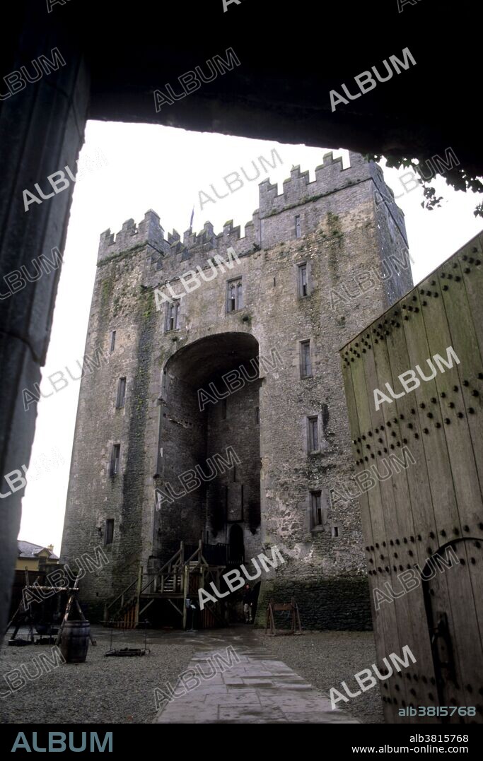 A view through a gate at Bunratty Castle located in the center of Bunratty village near Shannon, Ireland.