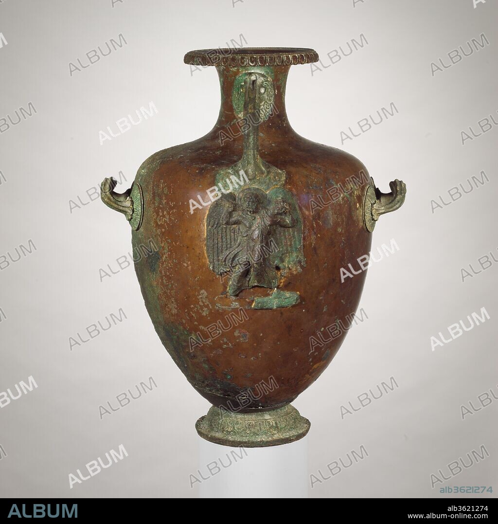 Bronze hydria (water jar). Culture: Greek. Dimensions: H. 19 1/16 in. (48.4 cm). Date: ca. 375-350 B.C..
The relief under the handle shows Boreas, the north wind, abducting Oreithyia, the daughter of Erechtheus, legendary king of Athens.