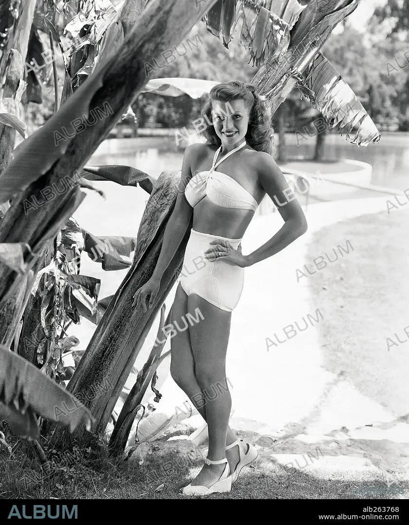 Portrait of Rita Hayworth posed with Swimwear in the Swimming Pool