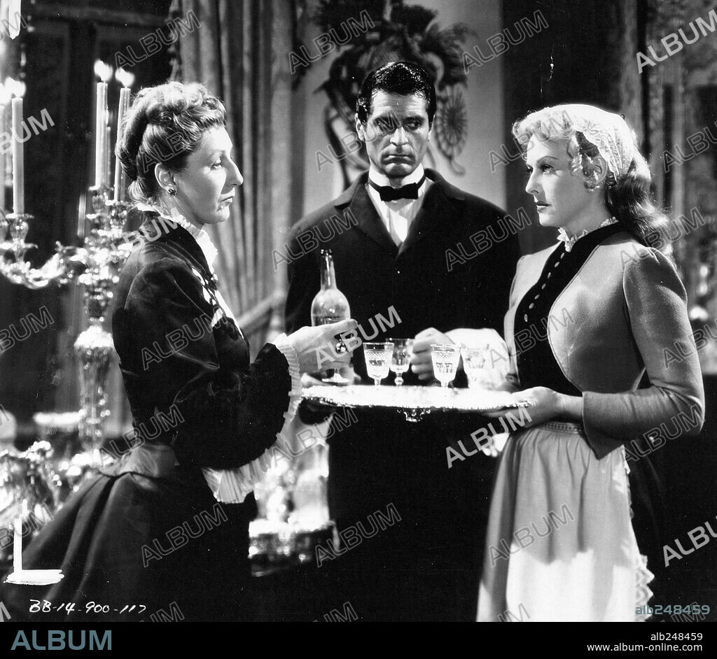 FRANCIS LEDERER, JUDITH ANDERSON and PAULETTE GODDARD in THE DIARY OF A CHAMBERMAID, 1946, directed by JEAN RENOIR. Copyright UNITED ARTISTS.