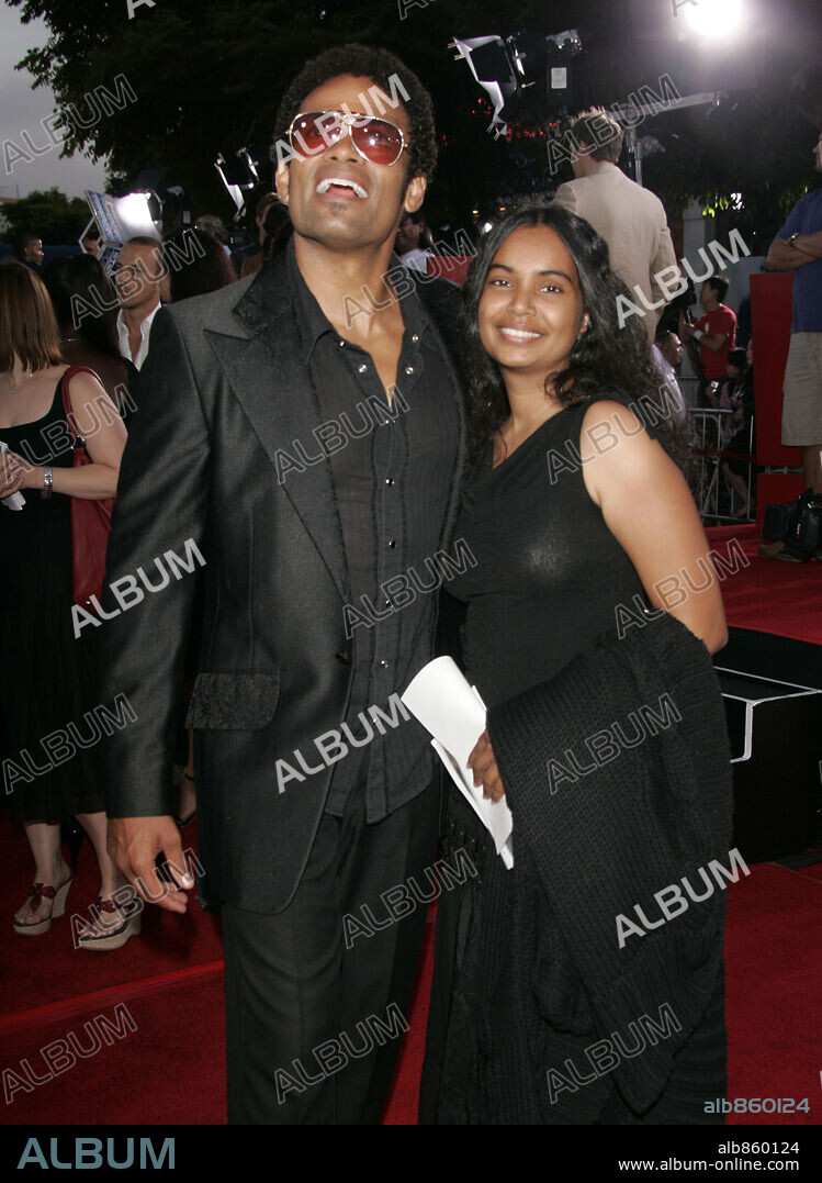 Jul 20, 2006; Westwood, California, USA; Director MARIO VAN PEEBLES & WIFE at the 'Miami Vice' World Premiere held at the Mann Village Theatre. Mandatory Credit: Photo by Lisa O'Connor / ZUMA Press. (©) Copyright 2006 by Lisa O'Connor. 20/07/2006