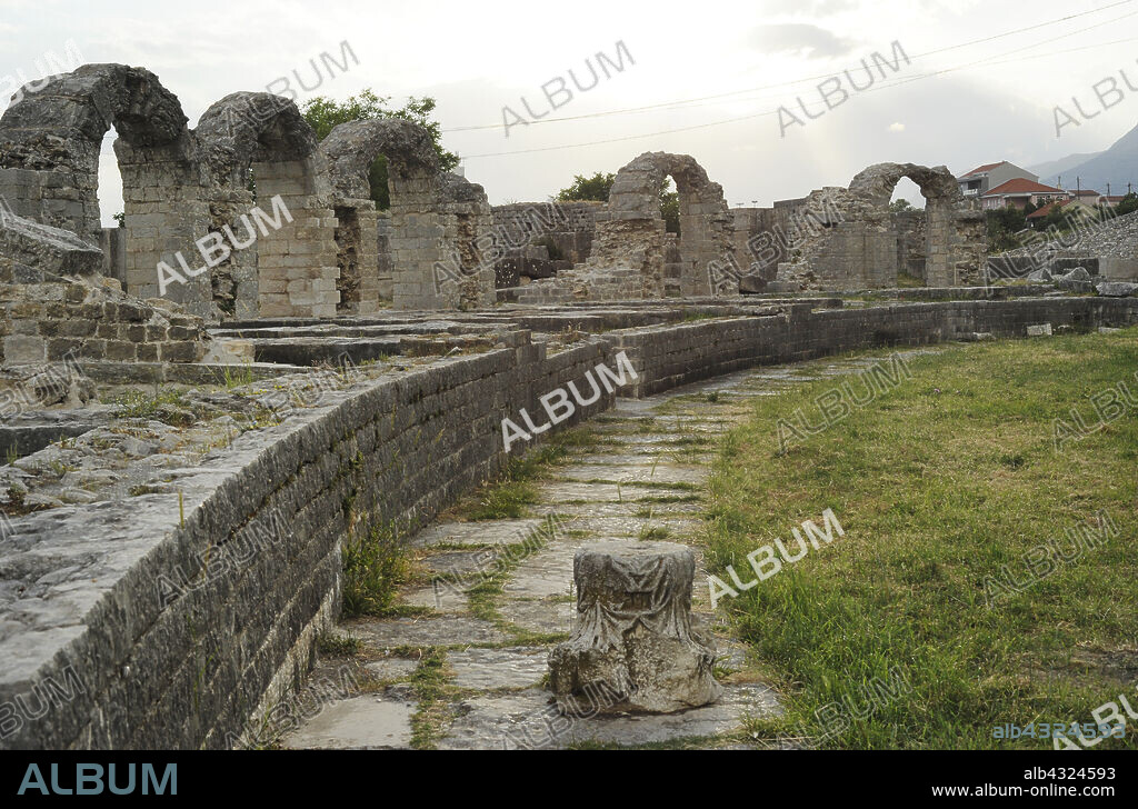 Croatia, Solin. Ancient city of Salona. Colonia Martia Ivlia Valeria. It was the capital of the Roman province of Dalmatia. Ruins of the amphitheater, built in the second half of the 2nd century AD. In the foreground, remains of a capital.