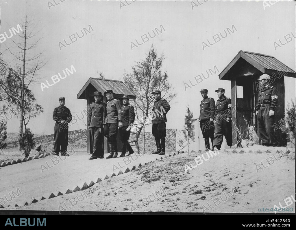 Communist Delegates at Panmunjom ***** Eachange Plan Now Agreed -- Communist delegates leave after a meeting with United Naions liaison officers at the Panmunjom (Korea) conference site to discuss the exchange of sick and wounded prisoners. (The exchange was agreed by the two sides the day, Friday, and it is expected that the agreement will be signed tomorrow). This picture was taken after the Communists had been handed by the U.N. representatives a letter from General Mark Clark, the United Nations commander, proposing an early meeting of higher level liaison groups to make the necessary detailed arrangements for the exchange without waiting for the and of hostilities. April 10, 1953.