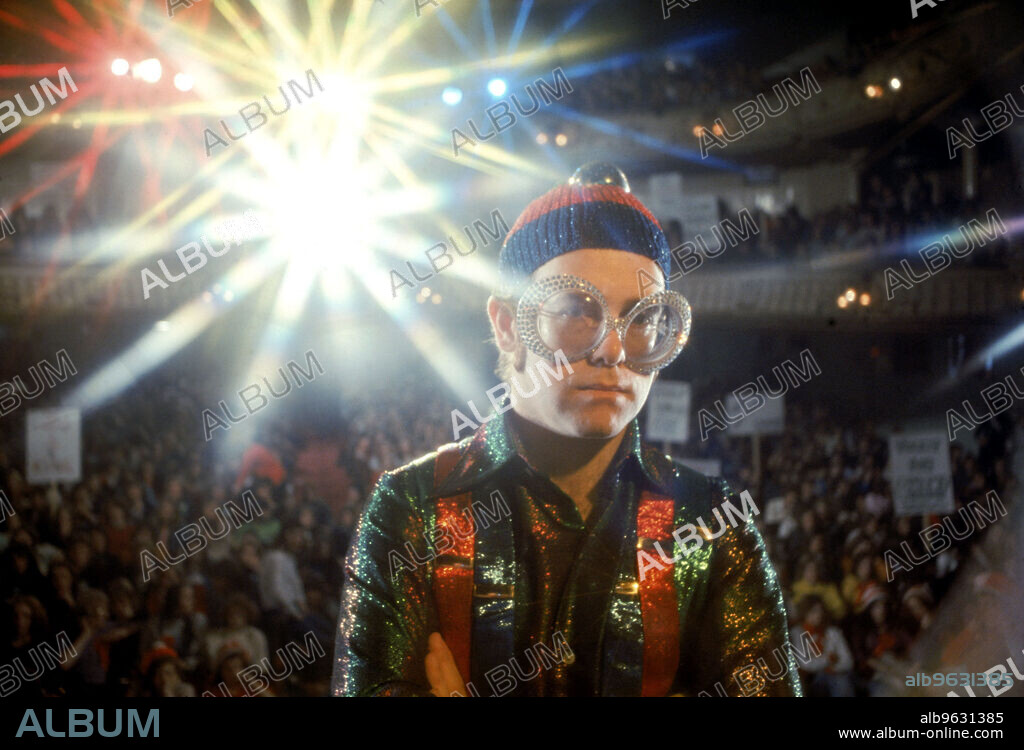 ELTON JOHN in TOMMY, 1975, directed by KEN RUSSELL. Copyright RBT STIGWOOD PRODS/HEMDALE.