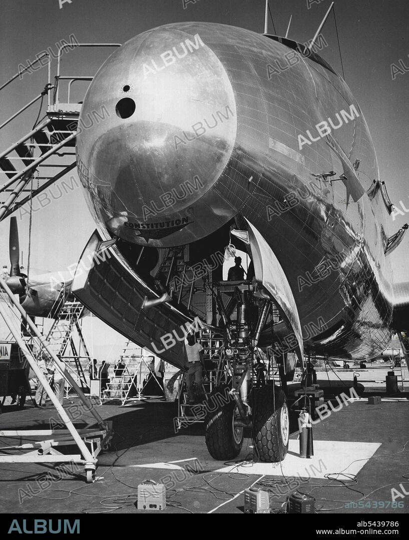 Nose landing gear of the Navy's Lockheed Constitution, world's largest transport airplane. The wheels are 44 inches in diameter. When the Constitution is in service, there will be a passenger entrance through the nose landing gear wheel well. May 26, 1947. ;Nose landing gear of the Navy's Lockheed Constitution, world's largest transport airplane. The wheels are 44 inches in diameter. When the Constitution is in service, there will be a passenger entrance through the nose landing gear wheel well.