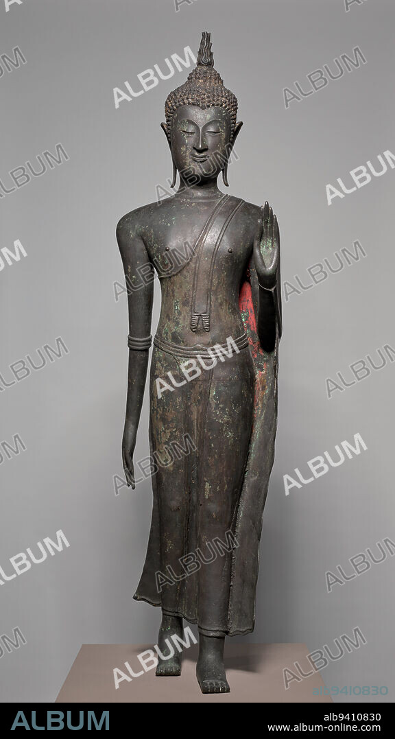 Walking Shakyamuni Buddha, 15th century, 50 1/2 in. (128.27 cm), Bronze with traces of pigment, Thailand, 15th century, This sculpture highlights the Buddha as a teacher of the people, walking peacefully yet radiantly with lowered eyes. The historical Buddhaborn Siddhartha Gautama, but more commonly known in Buddhism as Shakyamuni (Sage of the Shakya Clan)renounced his princely life at age 29 after becoming aware of the suffering inherent in human life. Upon attaining enlightenment, he devoted his life to teaching people throughout northern India about a means of escaping sufferingthrough a combination of wisdom and compassion. Sculptures of so-called Walking Buddhas, with an elegantly draped monastic robe and sinuous limbs, are a trademark of the Sukhothai Kingdom of Thailand, which flourished in the 1300s and 1400s.