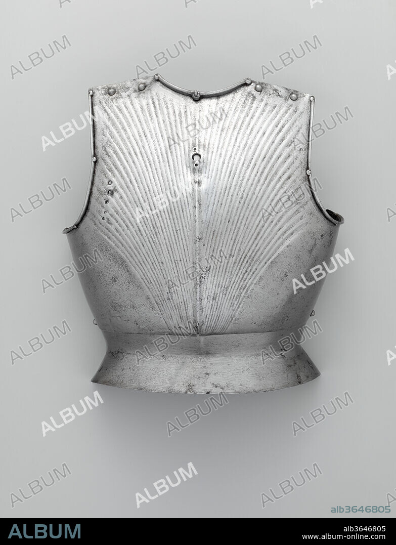 Breastplate (Kastenbrust). Culture: German. Dimensions: H. 16 in. (40.6 cm); W. 14 1/2 in. (36.8 cm); D. 9 1/4 in. (23.5 cm); Wt. 5 lb. 4.4 oz. (2392.7 g). Date: ca. 1450.
Although it was in wide use across Europe by the early fifteenth century, very little plate armor survives from that period. This breastplate is one of the earliest German examples in existence. It is almost identical to the breastplate on a statue of Emperor Friedrich III (1415-1493), dated 1453, and represents the latest innovation in German armor design and technology of the time. Unfortunately, it is not known where Dean acquired this piece.