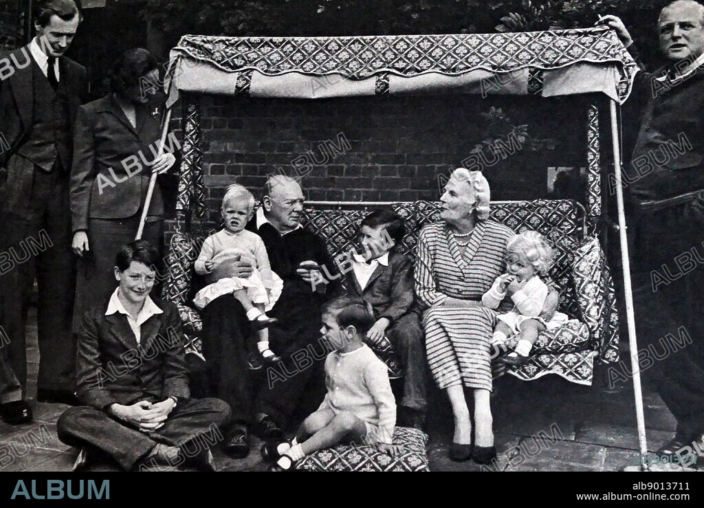 Photograph of Sir Winston Churchill, his wife Clementine, and his Grandchildren. Sir Winston Leonard Spencer-Churchill (1874-1965) a British politician and Prime Minister of the United Kingdom. Clementine Churchill (1885-1977) wife of Sir Winston Churchill. Dated 20th Century.